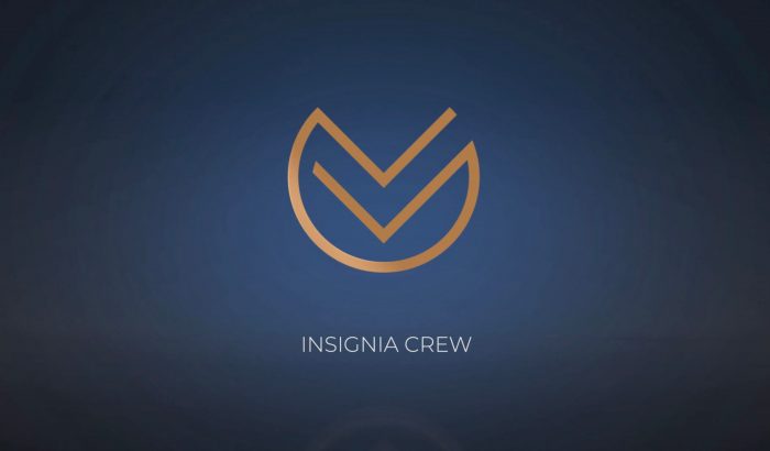 Insignia Crew logo in gold on a blue background